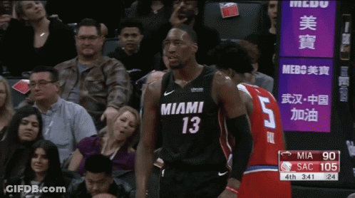 Man In Miami Jersey Beside Man In Red Jersey GIF