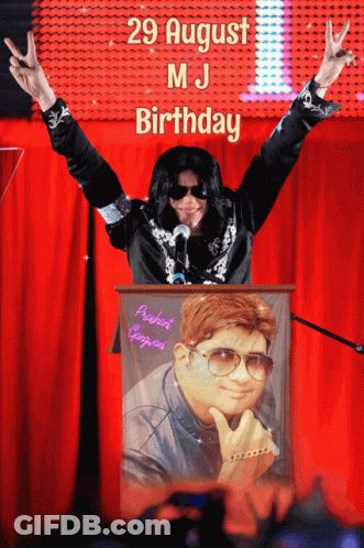 Man In Michael Jackson Costume At Podium With Arms Out GIF
