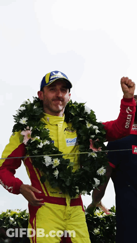 Man In Michelin Hat With Wreath GIF