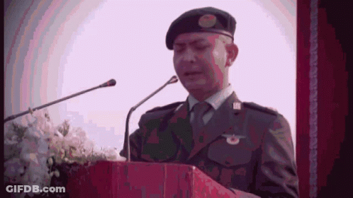 Man In Military Uniform At Podium Giving Speech GIF