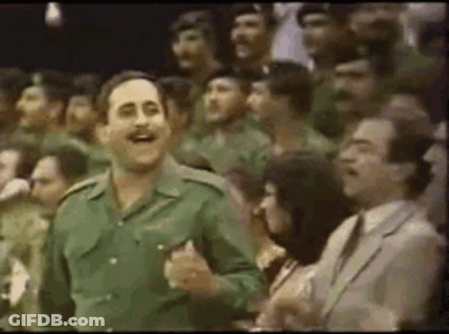Man In Military Uniform Dancing In Crowd GIF
