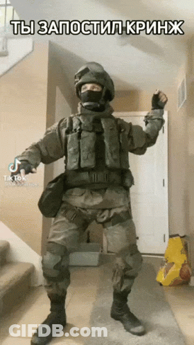Man In Military Uniform Dancing In Hallway GIF