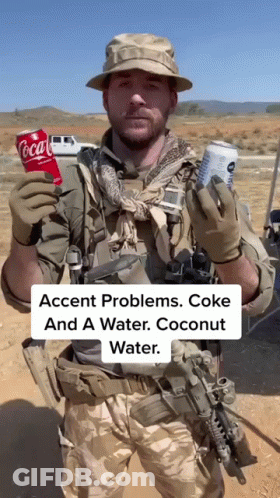 Man In Military Uniform Holding Coca Cola And Coconut Water GIF