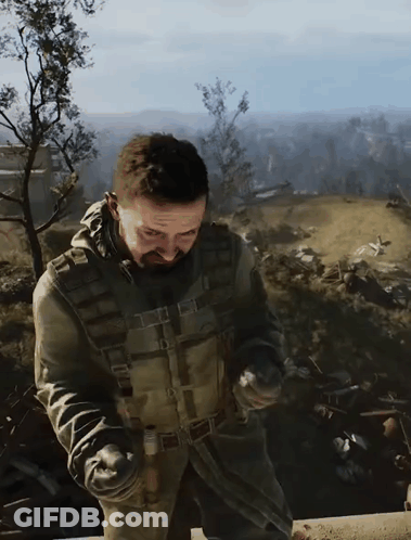 Man In Military Uniform Holding Grenade GIF