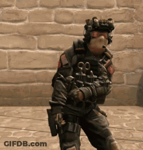 Man In Military Uniform Holding Gun GIF