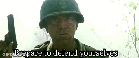 Man In Military Uniform Holding Gun Says Prepare To Defend Yourselfs GIF