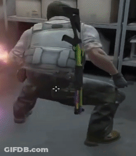 Man In Military Uniform Holding Gun GIF