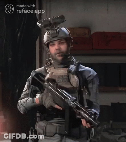 Man In Military Uniform Holding Rifle With Reface Logo GIF