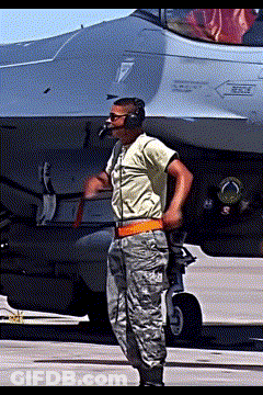 Man In Military Uniform In Front Of Fighter Jet With Rescue GIF