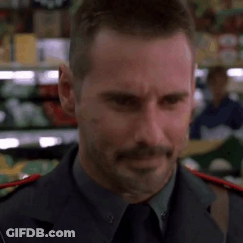 Man In Military Uniform In Grocery GIF