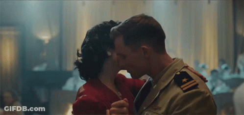 Man In Military Uniform Kissing Woman GIF