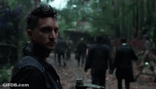 Man In Military Uniform Looking At Camera GIF