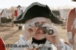 Man In Military Uniform Looking Through Binoculars GIF