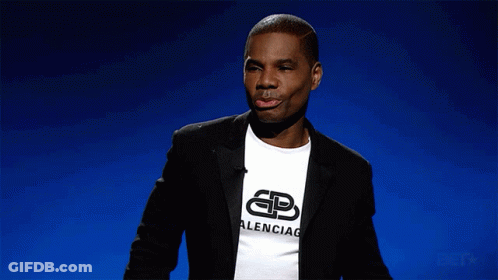 Man In Military Uniform Sitting With BET Logo GIF