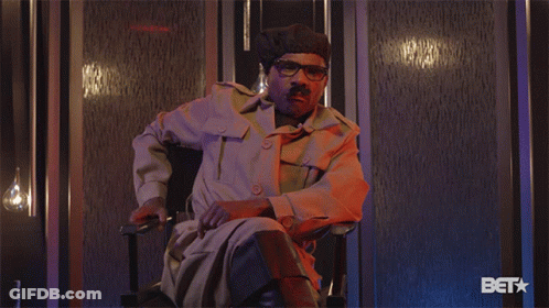 Man In Military Uniform Sitting With BET Logo GIF