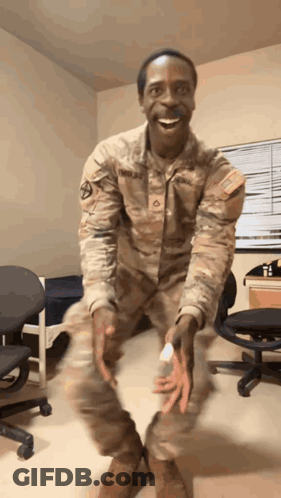 Man In Military Uniform Smiling GIF