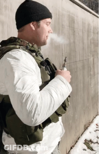 Man In Military Uniform Smoking Pipe GIF
