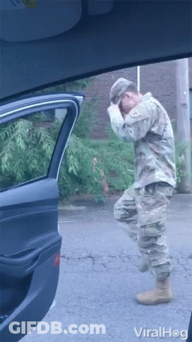 Man In Military Uniform Standing In Front Of Car Viralhog GIF