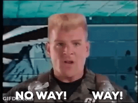 Man In Military Uniform Standing In Front Of Wall GIF