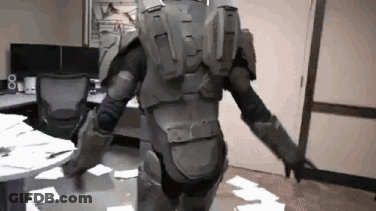 Man In Military Uniform Standing In Room GIF