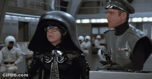 Man In Military Uniform Standing Next To Another Man GIF