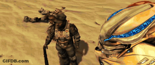 Man In Military Uniform Standing Next To Helmet With Blue Light GIF
