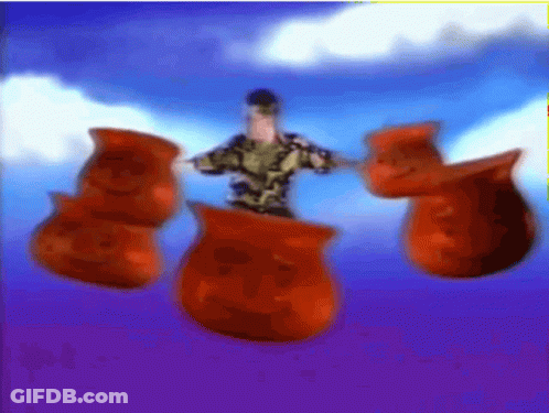 Man In Military Uniform Surrounded By Red Gummy Bears GIF