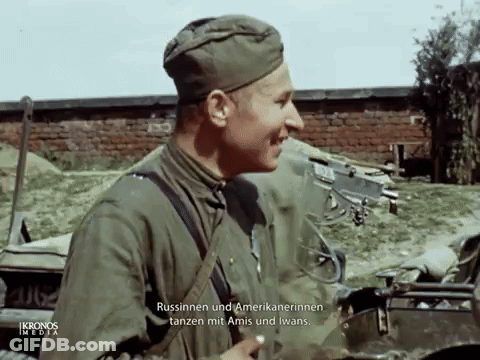 Man In Military Uniform Talking To Another Man GIF