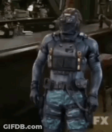 Man In Military Uniform Talking With Disgusting Above Him GIF