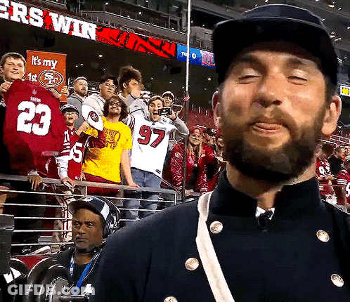 Man In Military Uniform Wearing Number 23 Jersey At Football Game GIF