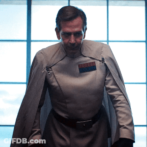 Man In Military Uniform With Commander Badge GIF