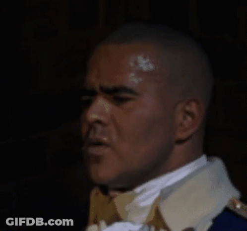 Man In Military Uniform With Face Paint GIF