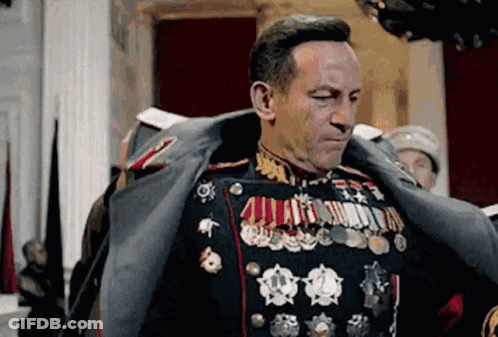 Man In Military Uniform With Medals GIF
