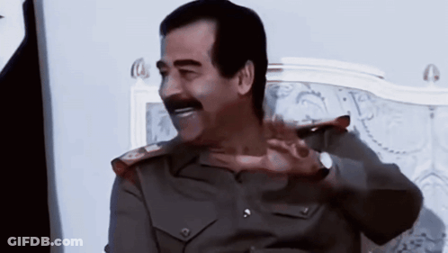 Man In Military Uniform With Mustache On Bed GIF