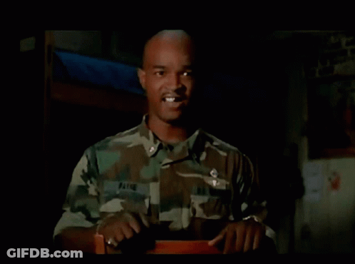 Man In Military Uniform With Payne On Collar GIF