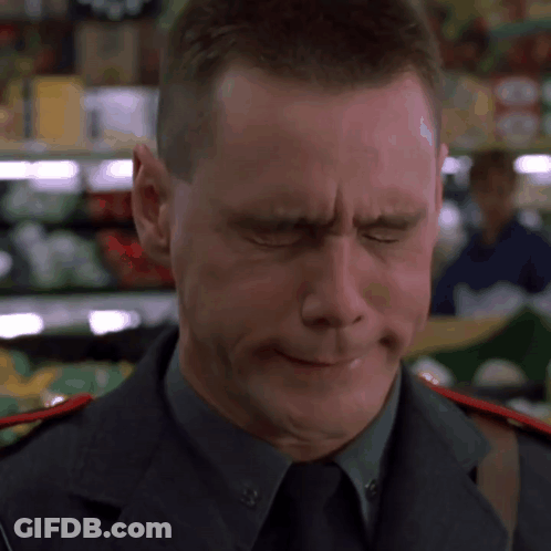 Man In Military Uniform With Red Collar Stripe GIF