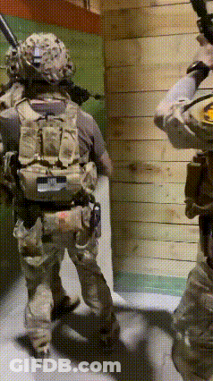 Man In Military Uniform With SDC Badge GIF