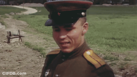 Man In Military Uniform With Shoulder Badge GIF