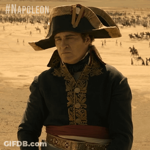 Man In Military Uniform With Sword GIF