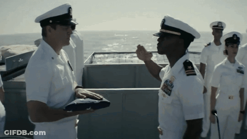 Man In Military Uniform With U.S. Navy Badge GIF