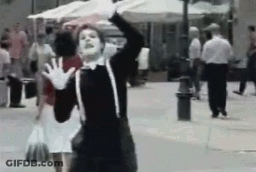 Man In Mime Costume Walking GIF