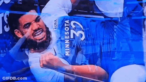Man In Minnesota 32 Jersey On Screen GIF