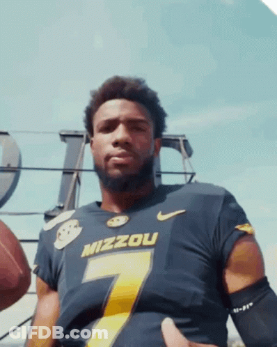 Man In Mizzou Jersey Holding Football GIF