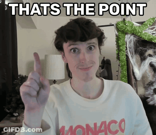 Man In Monaco Sweater Pointing Upwards GIF