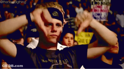 Man In Monster Shirt Giving Thumbs Down GIF