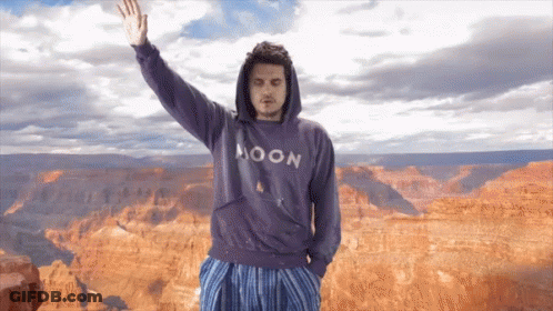 Man In Moon Sweatshirt At Grand Canyon GIF