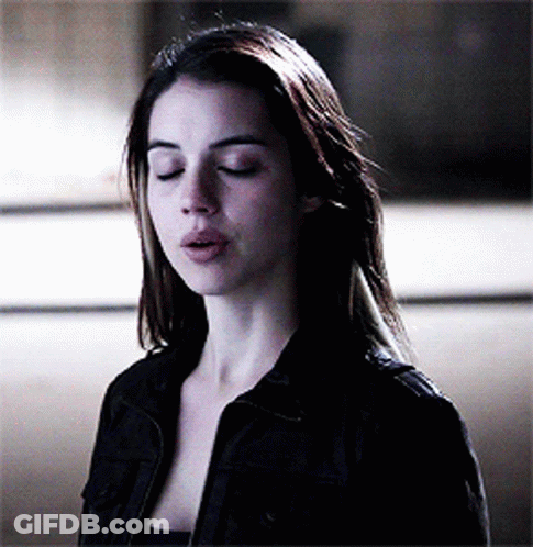 Man In Myka Shirt Lying On Bed GIF