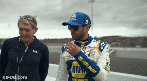 Man In Napa Auto Parts Jacket Next To Man With Sunglasses GIF