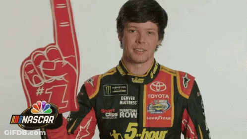 Man In NASCAR Uniform Holding Red Foam Finger GIF