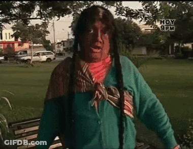 Man In Native American Costume Standing In Park With Hoy 9 PM GIF